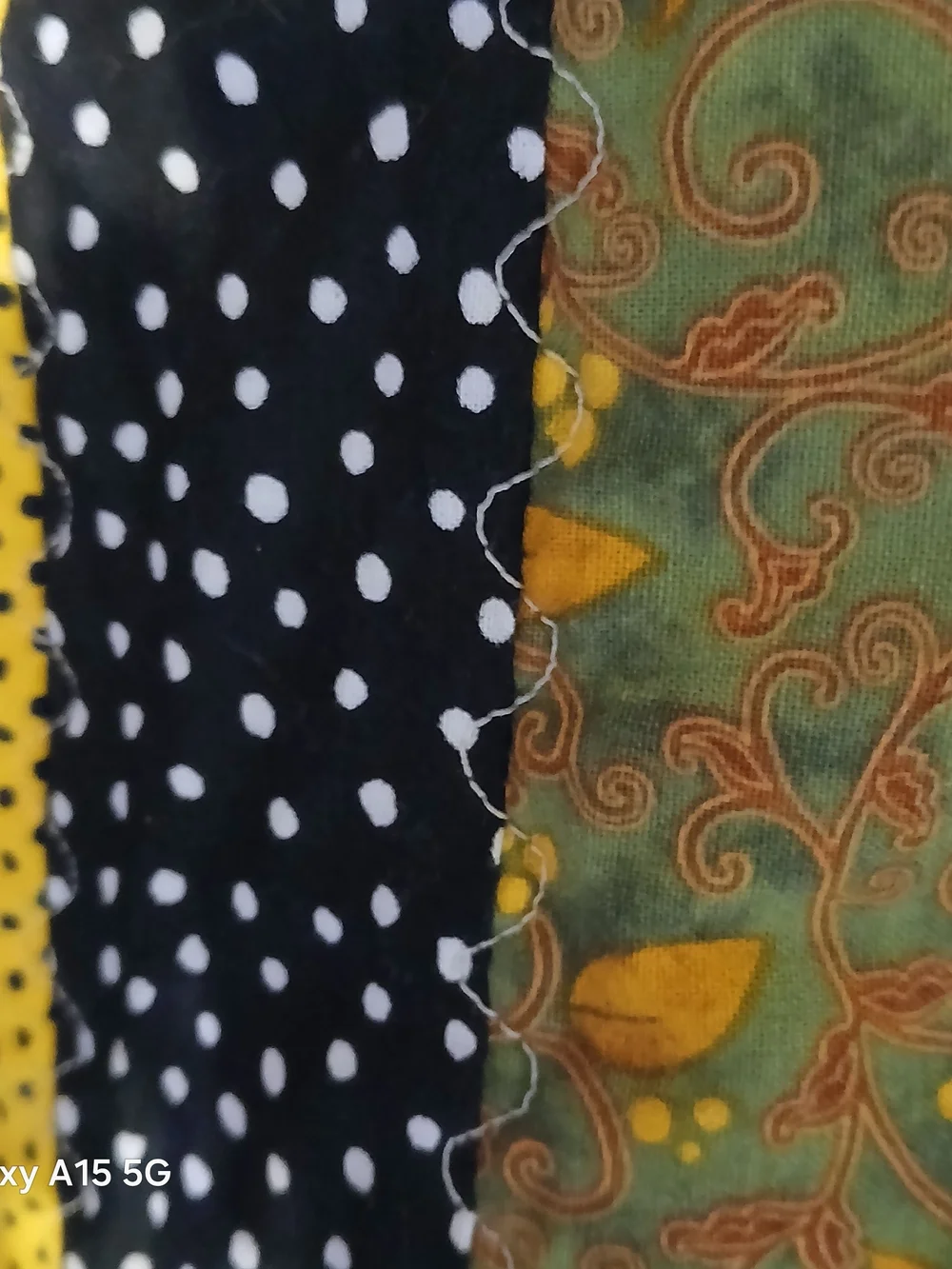 Hand Crafted Yellow and Olive Patchwork Quilt with Navy Polka Dot Border